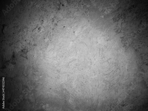 stone wall in black and white stucco background old concrete texture of old cement facade © OceanProd