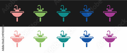 Set Washbasin with water tap icon isolated on black and white background. Vector