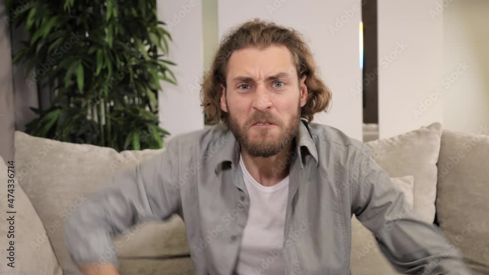 Portrait shot of sad desperate man saying what Funny angry man shows negative emotions looking upset frustrated worried excited, problems, sadness, virus, coronavirus, sad, crisis, problem.