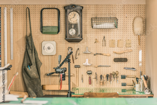 Working space and tools for leather craftsmen.	
