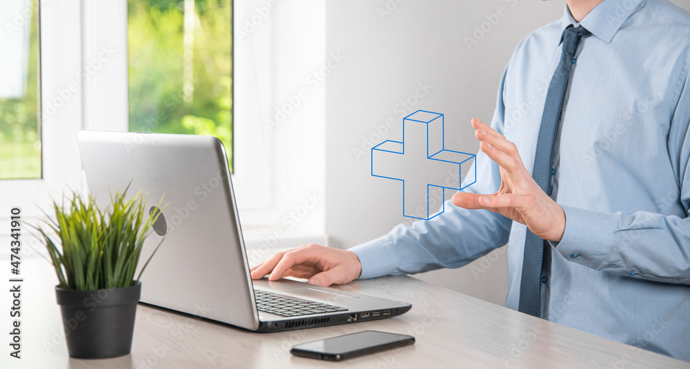 Obraz premium Businessman hold 3D plus icon, man hold in hand offer positive thing such as profit, benefits, development, CSR represented by plus sign.The hand shows the plus sign