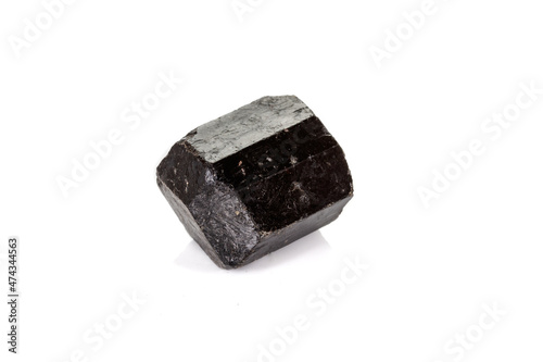 macro mineral stone schorl, black tourmaline on white background