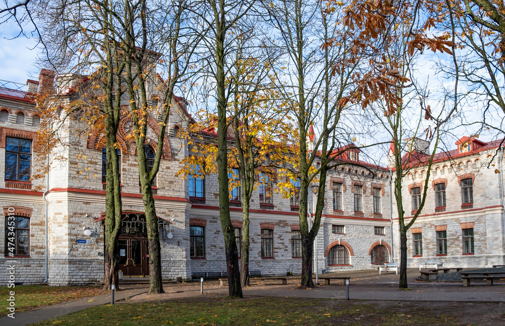 Naklejka premium Tallinn European School building. Estonia. Multilingual multicultural Tallinn European School. Autumn time. Stone building