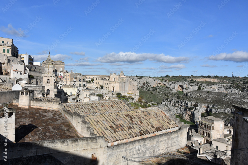 View of Matera, an ancient city built into the rock. It is located in the Basilicata region, Italy. View of Matera, an ancient city built into the rock. It is located in the Basilicata region, Italy.