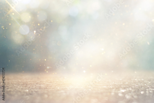 background of abstract gold and silver glitter lights. defocused © tomertu
