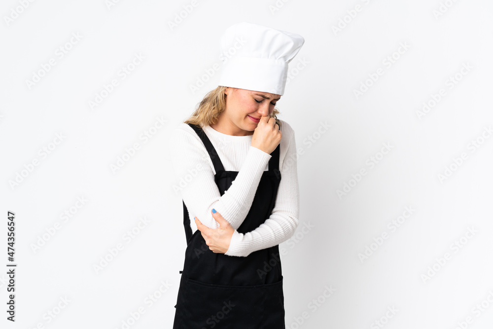 Young Brazilian chef woman isolated on white background having doubts Young Brazilian chef woman isolated on white background having doubts