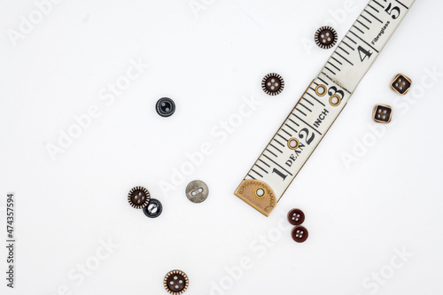 Stitching Material, Measurement Type, Thread Coan, Buttons.   photo