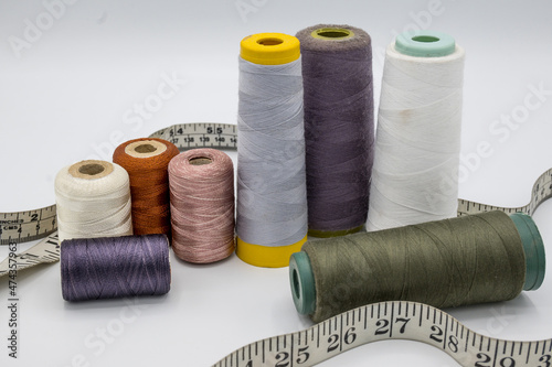 Stitching Material, Measurement Type, Thread Coan, Buttons.   photo