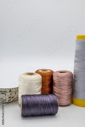 Stitching Material, Measurement Type, Thread Coan, Buttons.   photo