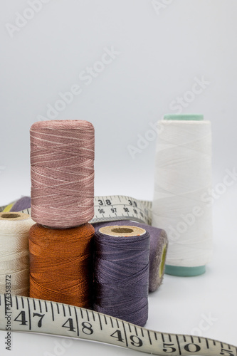 Stitching Material, Measurement Type, Thread Coan, Buttons.   photo