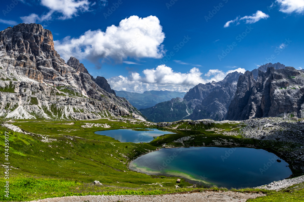 Alpine Landscape With Mountain Peaks And Clear Lakes At The Formation Tre Cime Di Lavaredo In The Dolomites Of South Tyrol In Italy