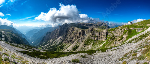Fototapeta Naklejka Na Ścianę i Meble -  Alpine Landscape With Mountain Peaks And View To Rifugio Auronzo On Mountain Tre Cime Di Lavaredo In South Tirol In Italy