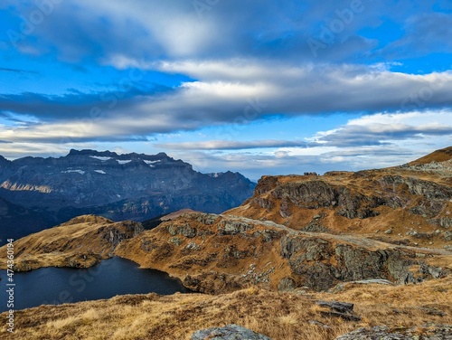 beautiful mountain landscape with a mountain lake between the valley. outdoor time in the alps. Autumn time. Elm Glarus