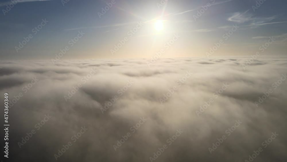 drone flight over the clouds at sunrise drone flight over the clouds at sunrise