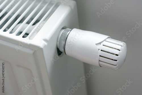 Heating radiator with temperature knob, regulator closeup