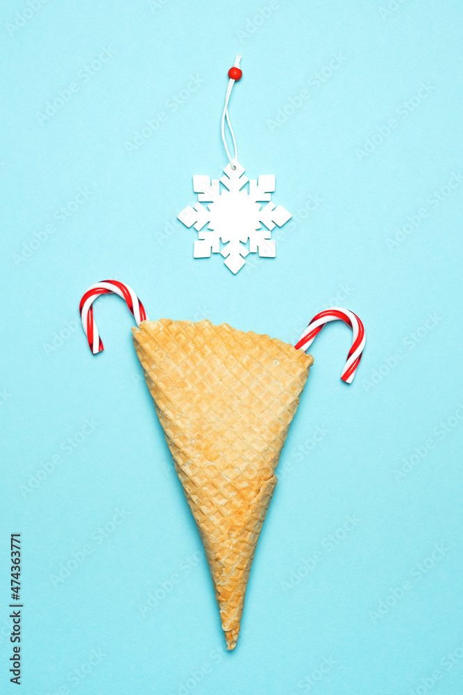Christmas composition of lollipops and decorations in the form of snowflakes. The concept of the New Year