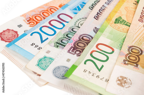Close-up of banknotes. Five thousand, five hundred, ten thousand, lead and one hundred rubles.