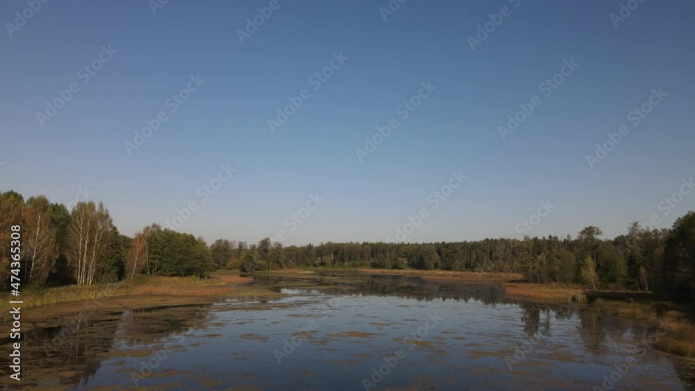 A flight over the lake.Autumn over Lake Komosa and in the forests of Podlasie. A flight over the lake.Autumn over Lake Komosa and in the forests of Podlasie.