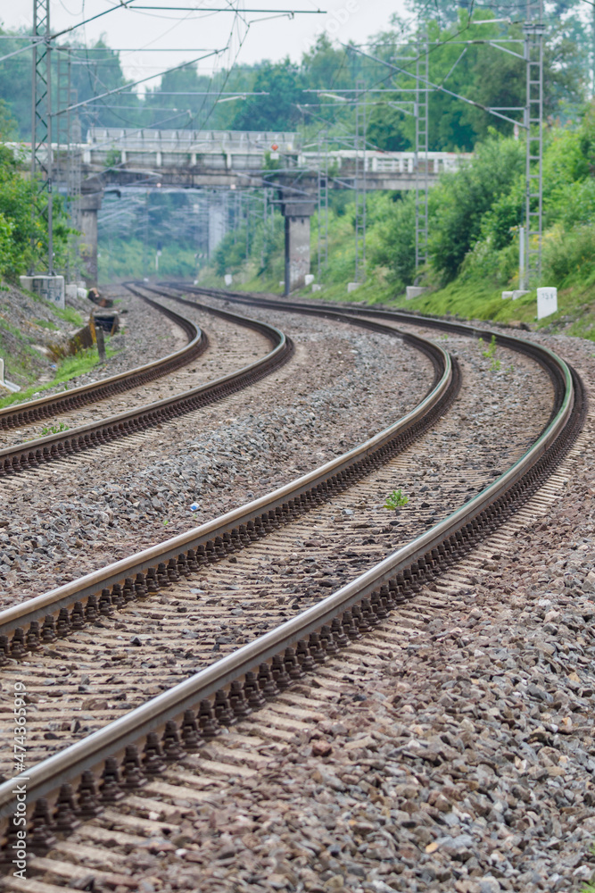 Fototapeta premium Train rails with sleepers and stones.