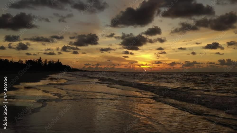 Beautiful golden sunset over the sea from a height Beautiful golden sunset over the sea from a height