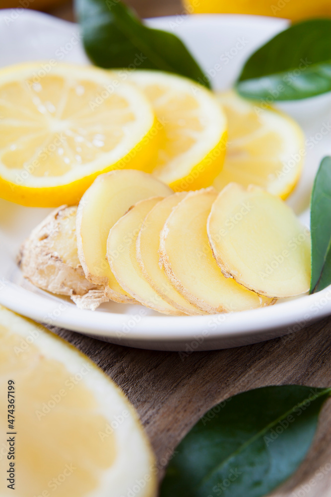 Lemon and ginger slices ready to make delicious hot tea. Lemon and ginger slices ready to make delicious hot tea.