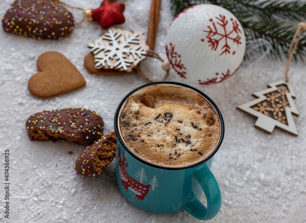 Christmas table close up with cookies, coffee cup and decoration