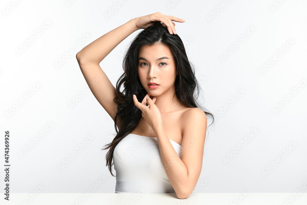 Beautiful young asian woman with clean fresh skin on white background, Face care, Facial treatment, Cosmetology, beauty and spa, Asian women portrait. Beautiful young asian woman with clean fresh skin on white background, Face care, Facial treatment, Cosmetology, beauty and spa, Asian women portrait.