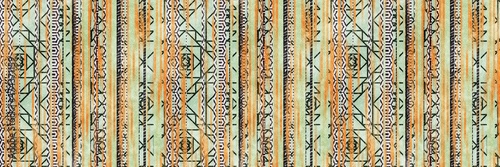 Seamless tribal ethnic stripe grungy border surface pattern design for print. High quality illustration. Faded rug or carpet like cover graphic tile. Thick lines filled with interesting geo textures.