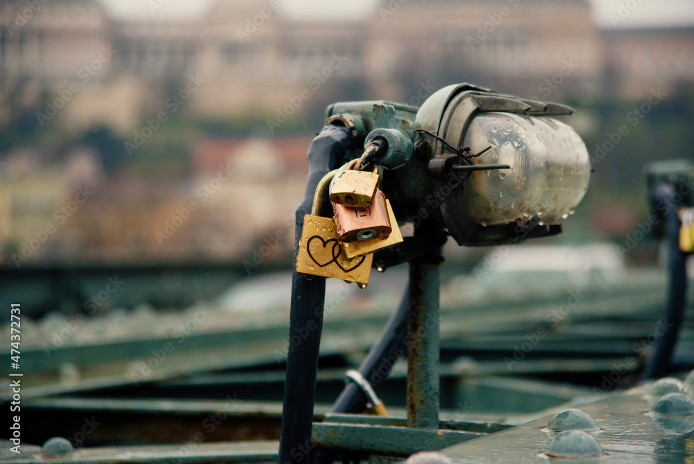 Close up photo of lock on bridge with heart shape in Budapest.