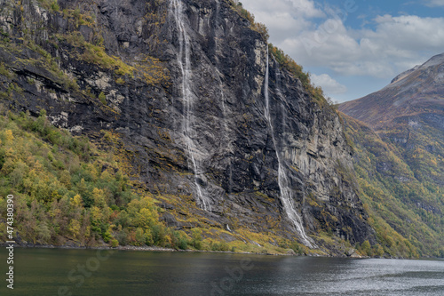 The Seven Sisters waterfall (Norwegian: De Syv Søstrene, Knivsflåfossen) located along the Geirangerfjorden in Stranda Municipality in Møre og Romsdal county, Norway photo