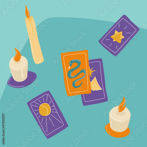 Cartomancy. On the table there are candles and tarot cards. The concept of divination, astrology and esotericism. Vector illustration.