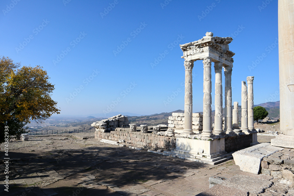 beautiful temple of Trajan with white marble columns on blue sky background, ancient city Pergamon, Turkey
