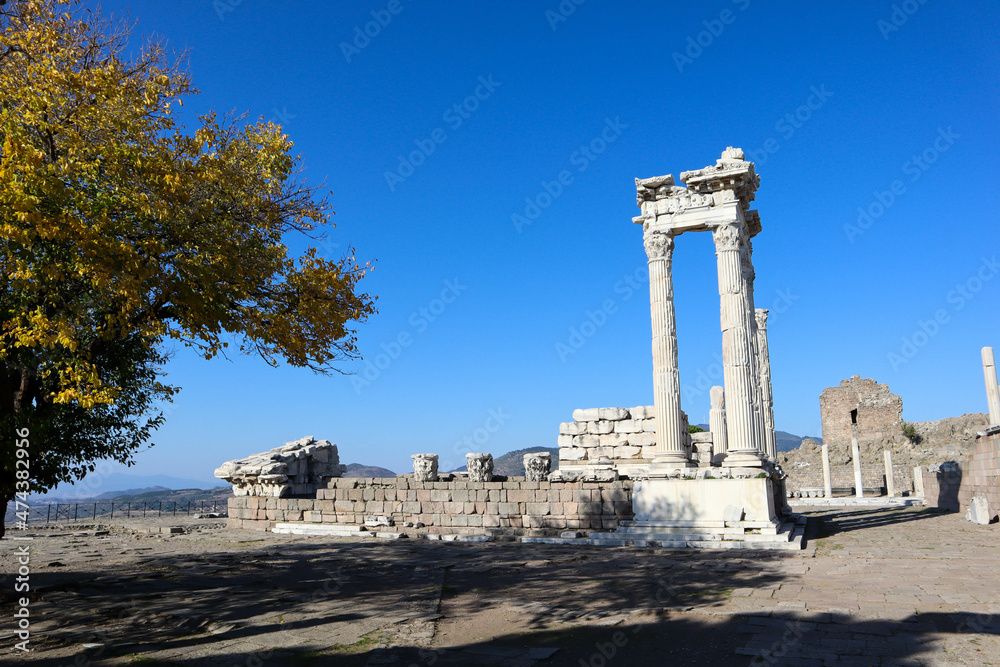 beautiful temple of Trajan with white marble columns on blue sky background, ancient city Pergamon, Turkey