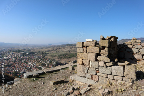 past and present - scenic view to the modern city Bergama in Turkey from ruins of ancient city Pergamon