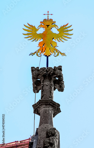 modern version of the double-headed eagle on the peak of a tower of the abbey church of Zwettl, Austria photo
