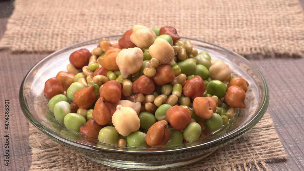 Healthy diet and vegetarian food. Mix of fresh sprouts on beautiful background. macrobiotic food. Sprouted wheat, peas, lentil seeds. Copy space
Healthy diet and vegetarian food. Mix of fresh sprouts on beautiful background. macrobiotic food. Sprouted wheat, peas, lentil seeds. Copy space