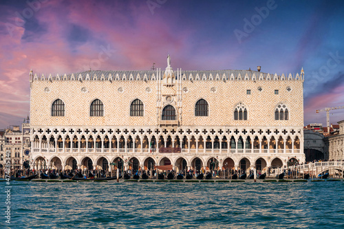 Venice, Italy. View of Palazzo Ducale (Doge's Palace), Ponte dei Sospiri (Bridge of sighs), Piazza San Marco. View from the vaporetto on the Grand Canal at sunset. Romantic view of Venice.