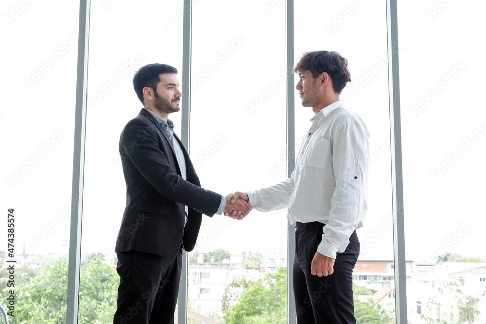 businessman and partnership handshaking in meeting room businessman and partnership handshaking in meeting room