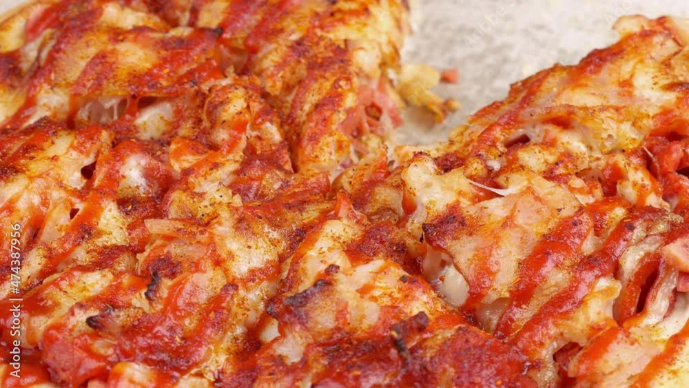 Close up pizza rotating on a box Close up pizza rotating on a box