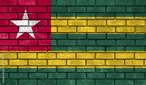Togo flag on a brick wall
