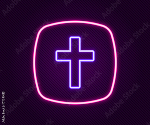 Glowing neon line Christian cross icon isolated on black background. Church cross. Colorful outline concept. Vector