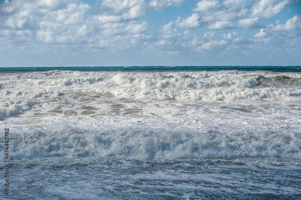 A strong November wind drives roaring waves to the shore, tearing white foam from them. All the beaches of Paphos and nearby villages are flooded with stormy waters.       