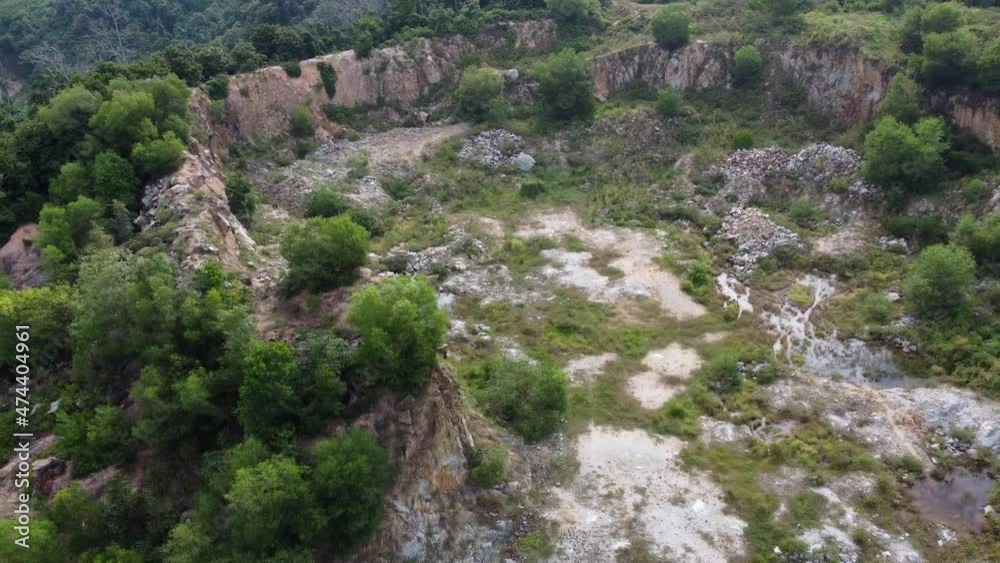 Aerial slide through the sand quarry in day Aerial slide through the sand quarry in day