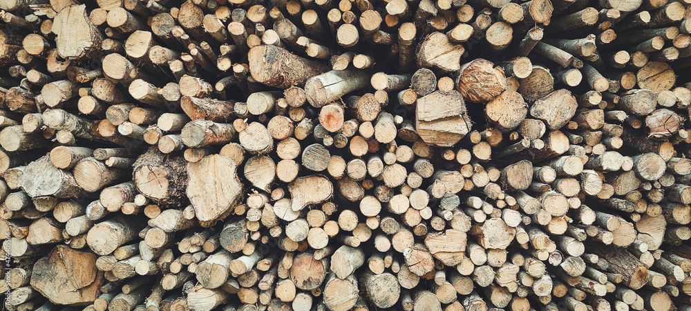 Neatly stacked woodpile for wood stove heating. Neatly stacked woodpile for wood stove heating.