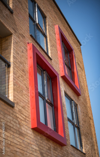 Modern red brick building.