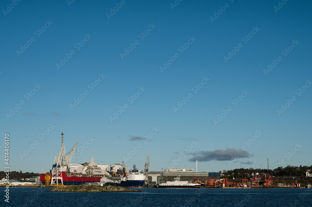 Scenic cityscape of modern norwegian town. Modern cargo port of Stavanger. Sunny day.