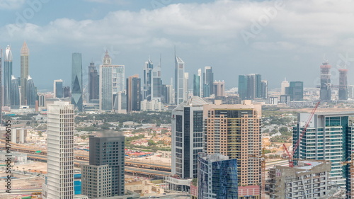 Rows of skyscrapers in financial district and business bay in Dubai aerial timelapse. © neiezhmakov