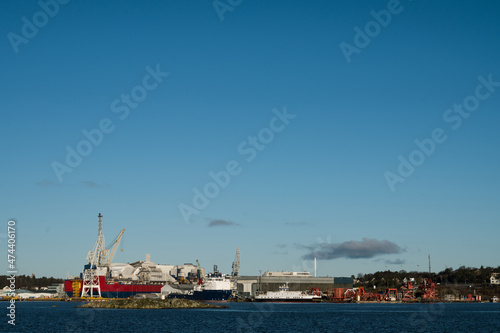Scenic cityscape of modern norwegian town. Modern cargo port of Stavanger. Sunny day.