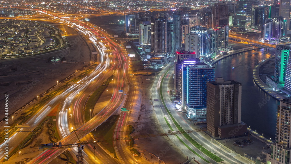 Skyline with modern architecture of Dubai business bay towers night timelapse. Aerial view Skyline with modern architecture of Dubai business bay towers night timelapse. Aerial view