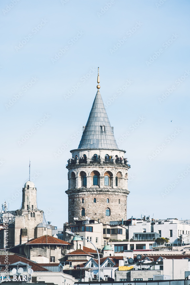Vertical photograph of Galata Tower taken from afar. Istanbul's historical Galata Tower. Vertical photograph of Galata Tower taken from afar. Istanbul's historical Galata Tower.